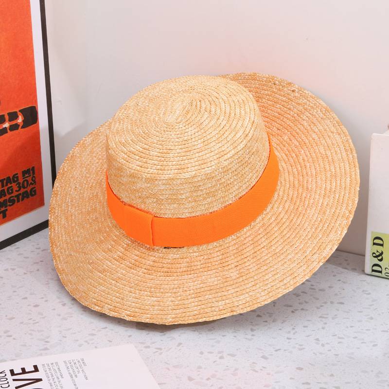 A Straw Hat With A Broad Brim - Image 6