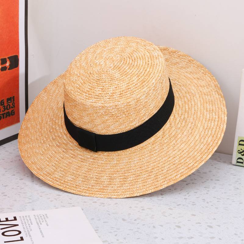 A Straw Hat With A Broad Brim - Image 5