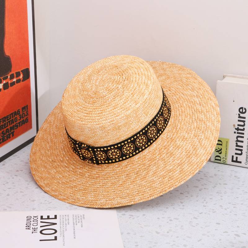 A Straw Hat With A Broad Brim - Image 3